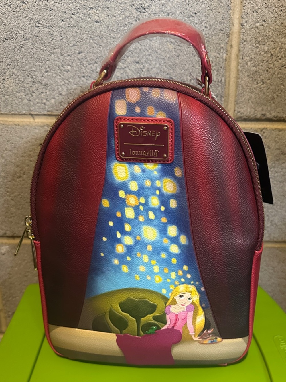 Loungefly Disney Rapunzel Lantern Backpack New with tags but small flaw see pics